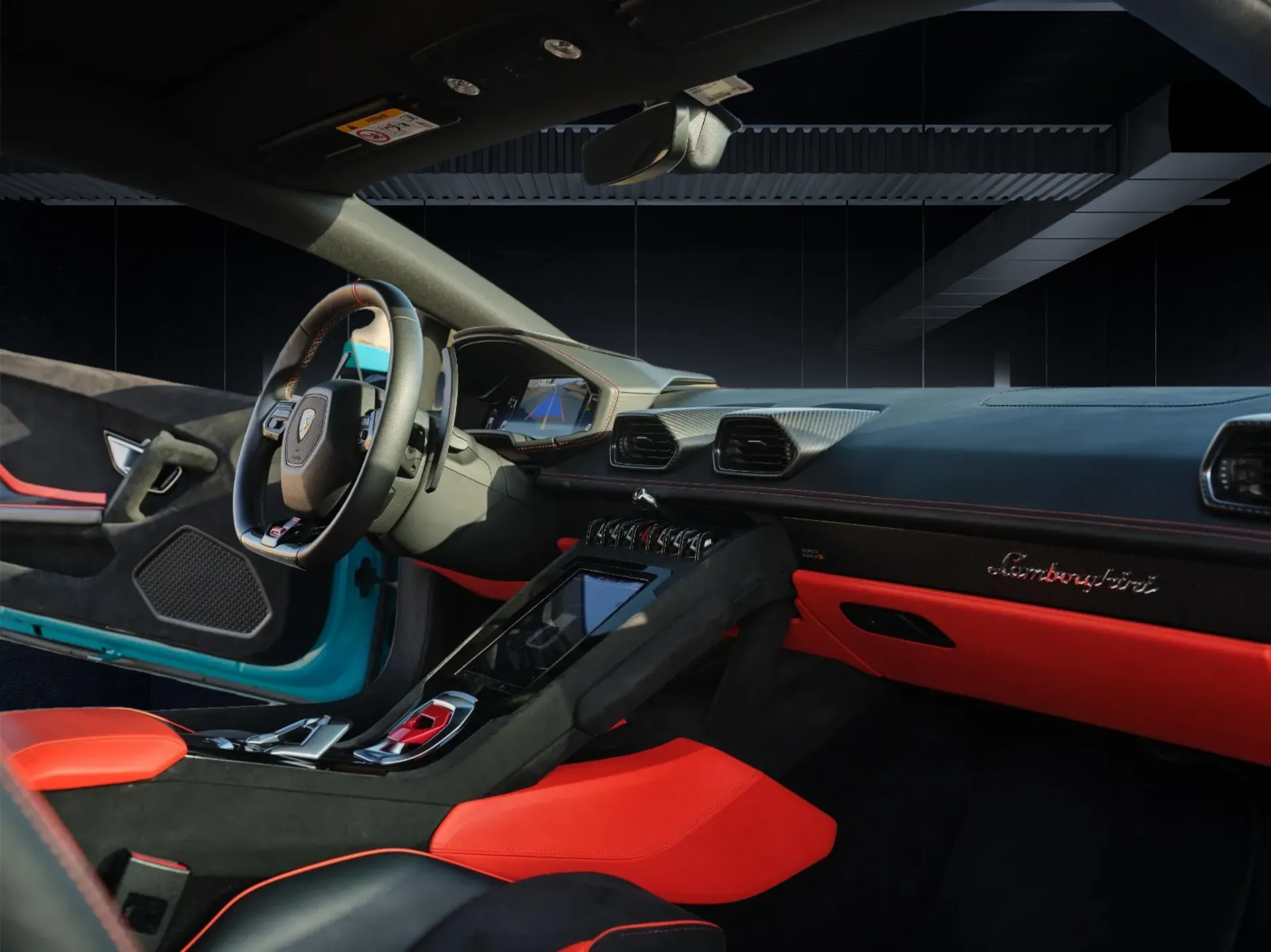 Lamborghini Huracán Tecnica interior with black and red seats