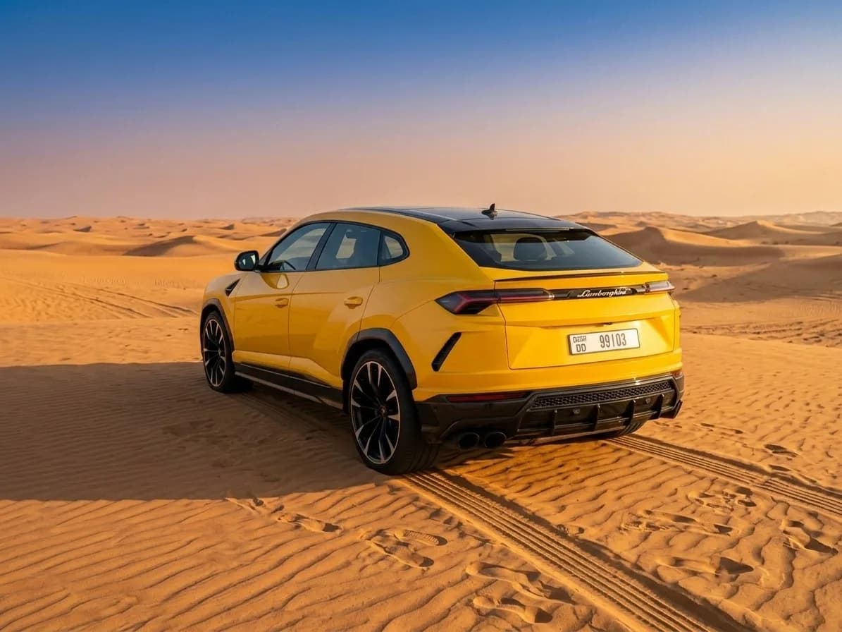 Yellow Lamborghini Urus rear three-quarter view with 23-inch wheels